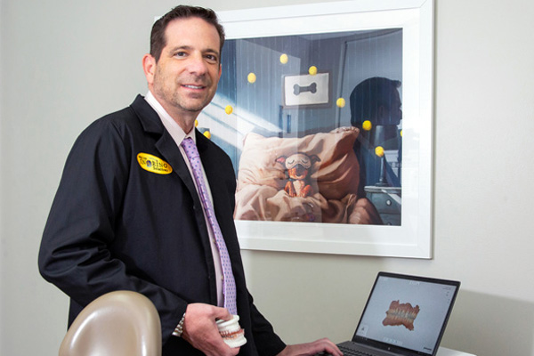 dental-implants-in-bryn-mawr Dr. Lieberman consulting a patient about dental implants in bryn mawr
